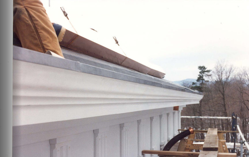 Installing the copper gutter at the cornice line